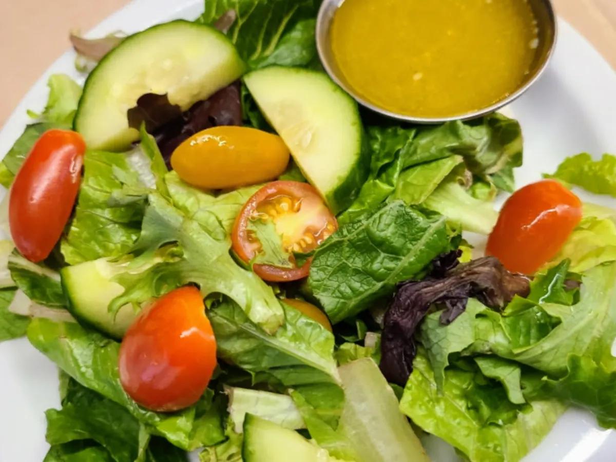 Fresh house salad with tomatoes and cucumber