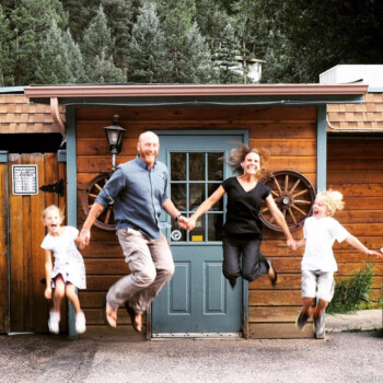 Blackbird Cafe team and young guests jumping outside the restaurant