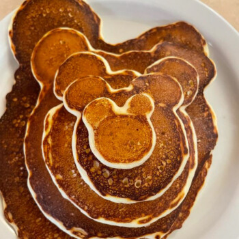 Bear-shaped pancake with powdered sugar
