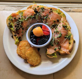 Breakfast plate with smoked salmon, eggs, and potatoes