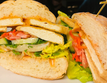 Turkey club sandwich with lettuce and tomato