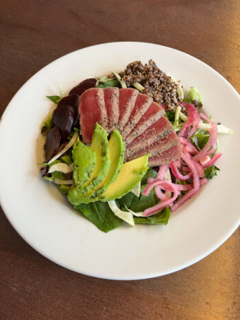 Seared tuna salad with avocado and pickled onion